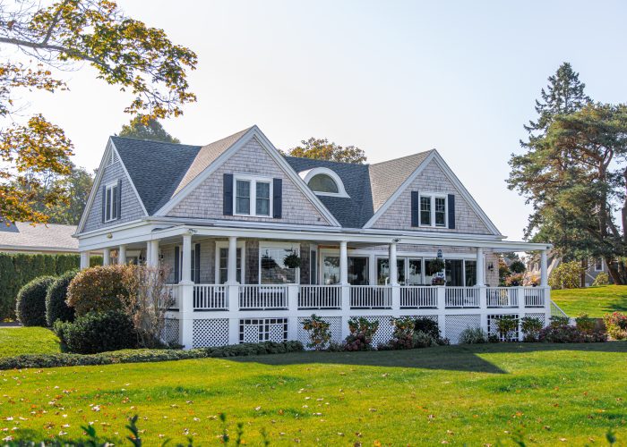 Large house on grassy lawn